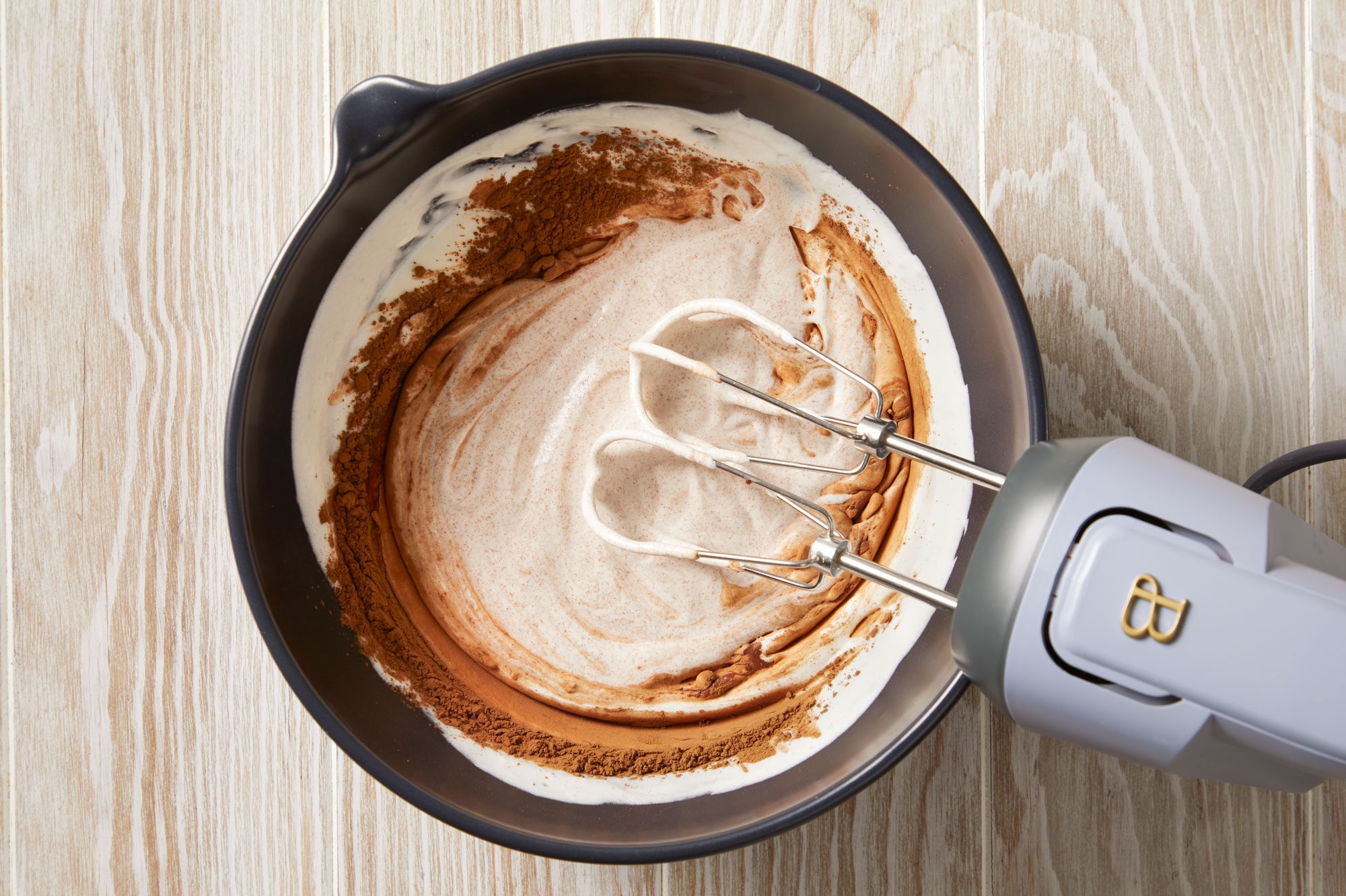 beat cream until it begins to thicken.