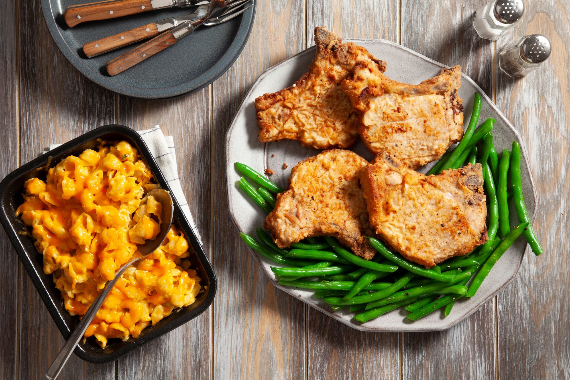 Fried Pork Chops on a wooden background