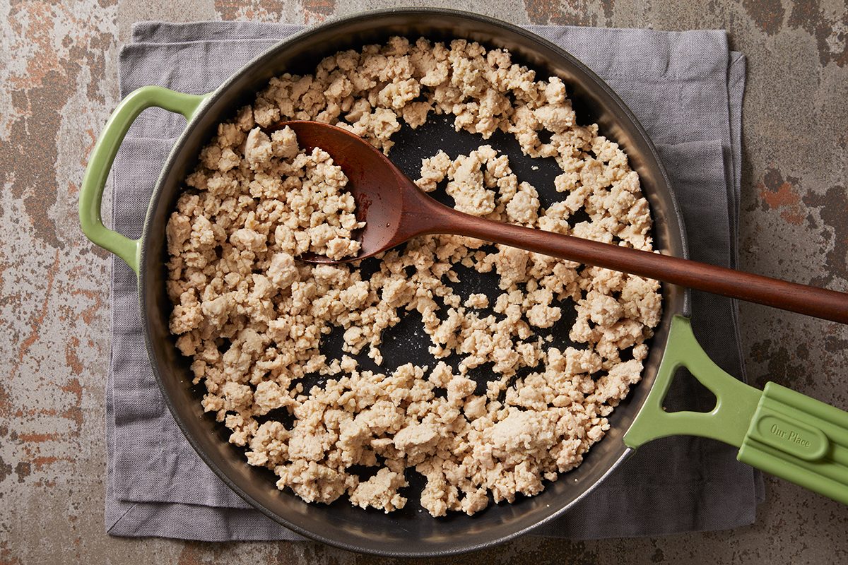 In a large skillet, cook chicken over medium heat until no longer pink,