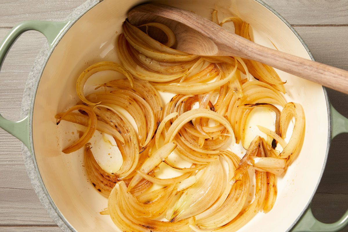 In a Dutch oven or large sauce pot, Add onions, cook until golden brown.