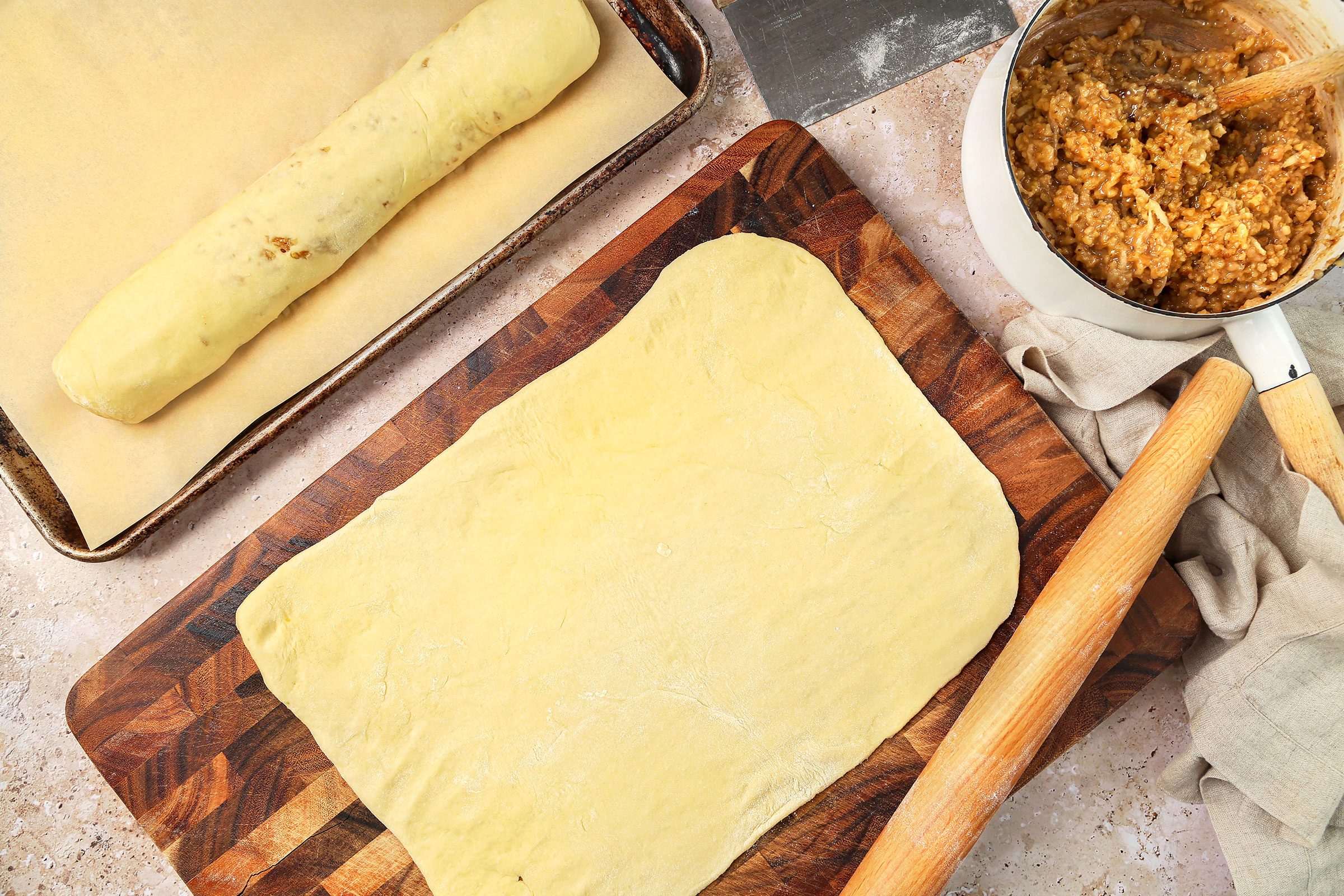 Rolled piece of dough into a 12x10-inch rectangle with a rolling pin