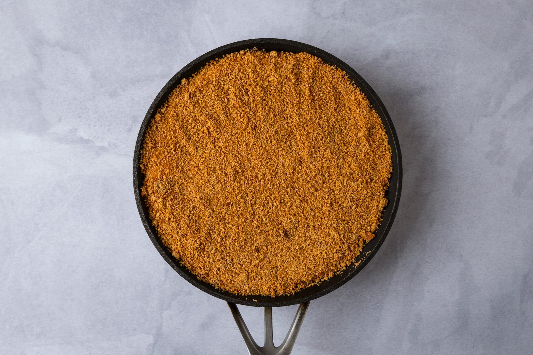 Add cracker crumbs and cinnamon; cook