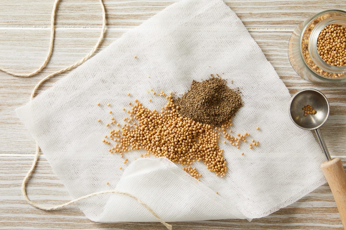mustard and celery seeds in the centre of a double thickness of cheesecloth