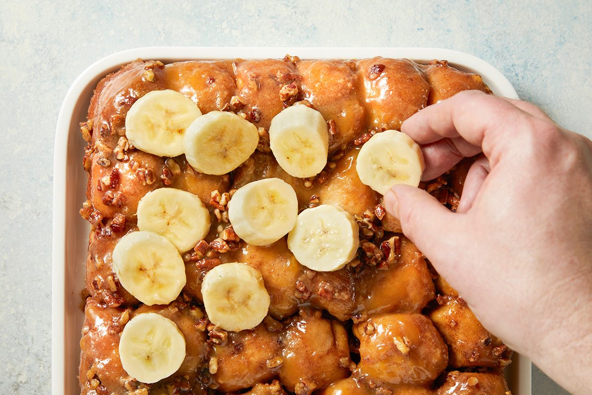 Overhead shot of top with sliced banana; drizzle with reserved glaze