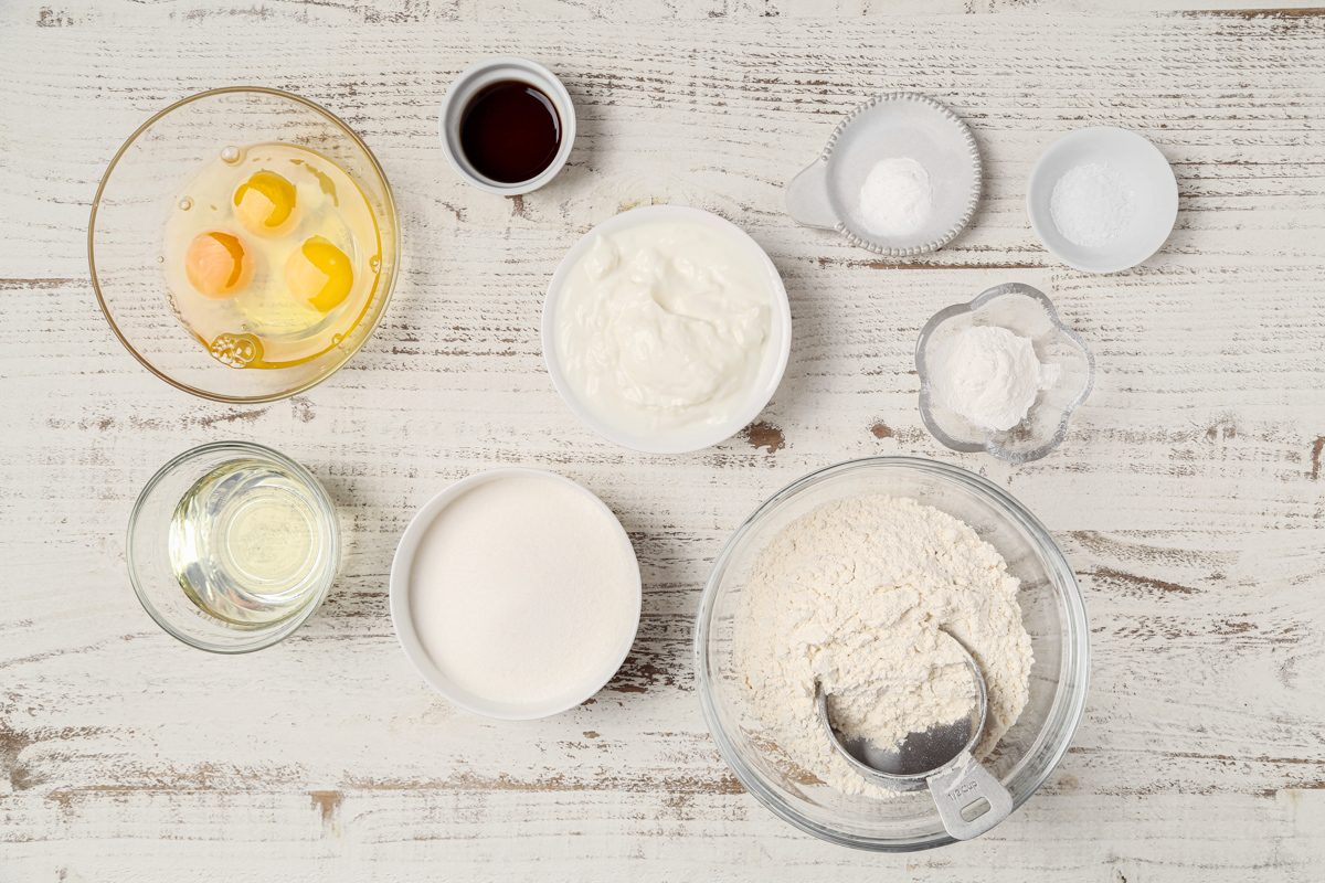 flour, whipped cream, salt, sugar, oil, eggs, greek yogurt, vanilla and leavener