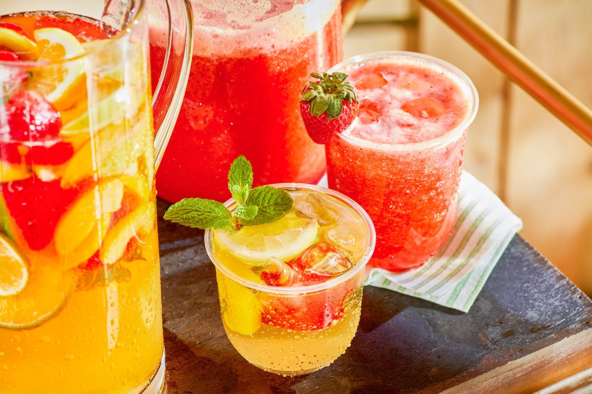 two different drinks are on table for outdoor drink station setup