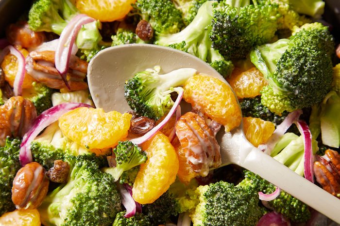 Broccoli Salad with Mandarin Oranges, Top Shot, green healthy salad, wooden spoon