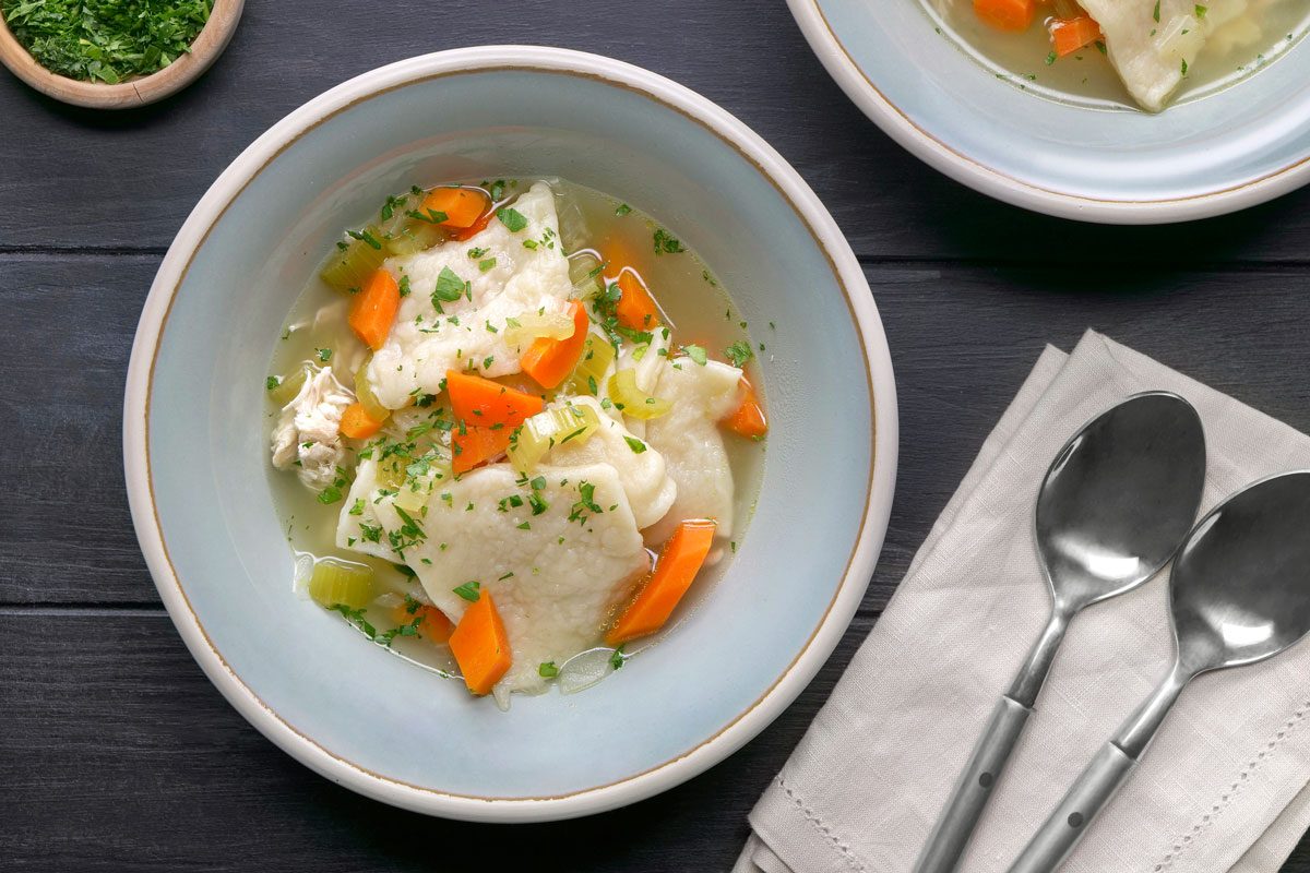 Chicken with Slippery Dumplings is ready and served in bowls