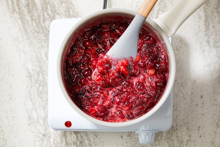 in a large saucepan; combine cranberries; sugar and water. Cook; uncovered