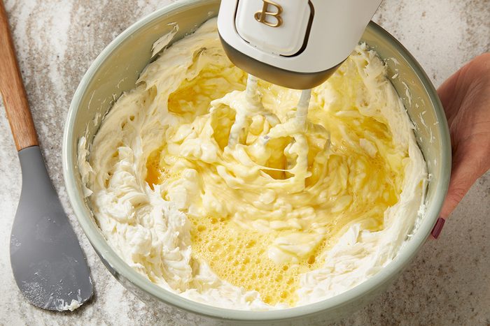 in a large bowl beat cream cheese; sugar and lemon juice until smooth; Add eggs