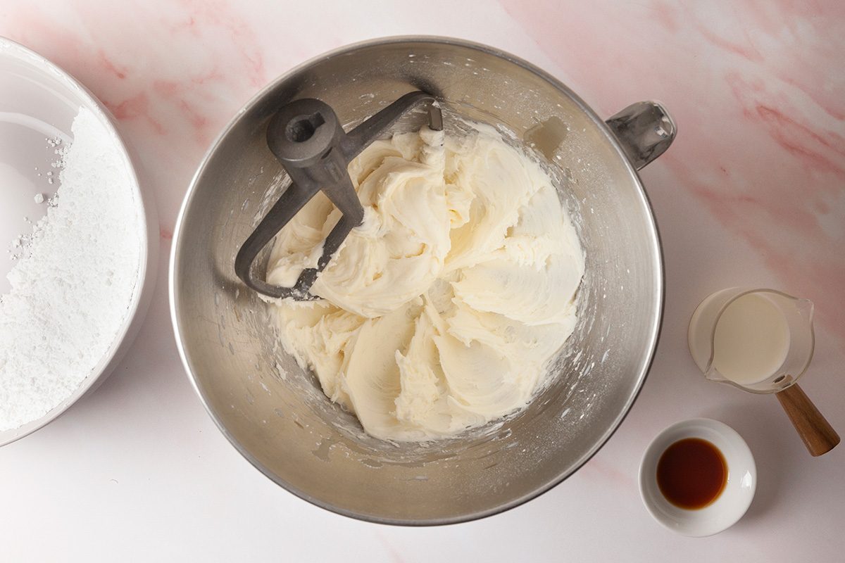 To make the buttercream, in a large bowl, beat softened butter for 3-4 minutes or until creamy and smooth afterwards add sugar; milk and vanilla extract