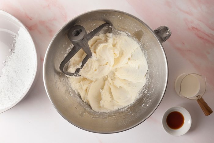 To make the buttercream, in a large bowl, beat softened butter for 3-4 minutes or until creamy and smooth afterwards add sugar; milk and vanilla extract