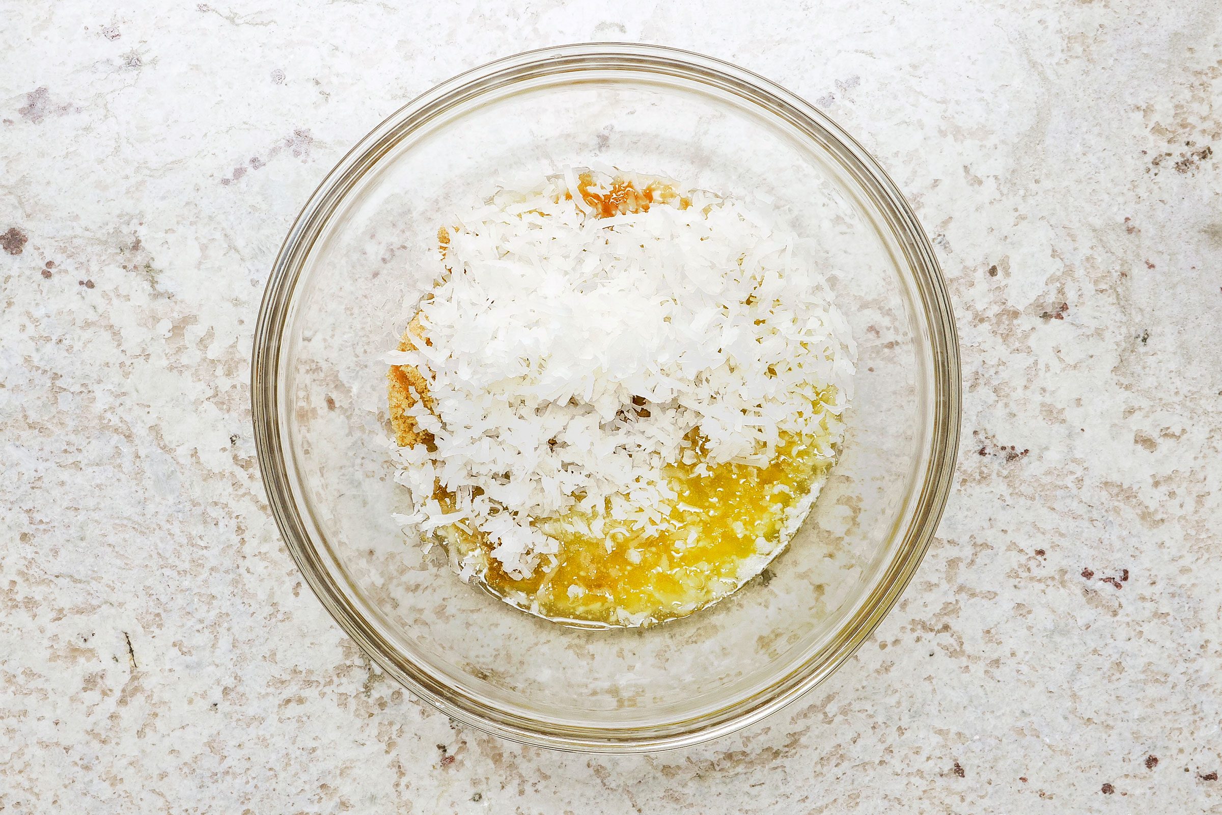 Brown sugar, melted butter, half-and-half cream and shredded coconut in a large bowl.