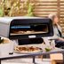 This Popular Kitchen Brand Just Dropped a Pizza Oven—And It's Loaded with Smart Features