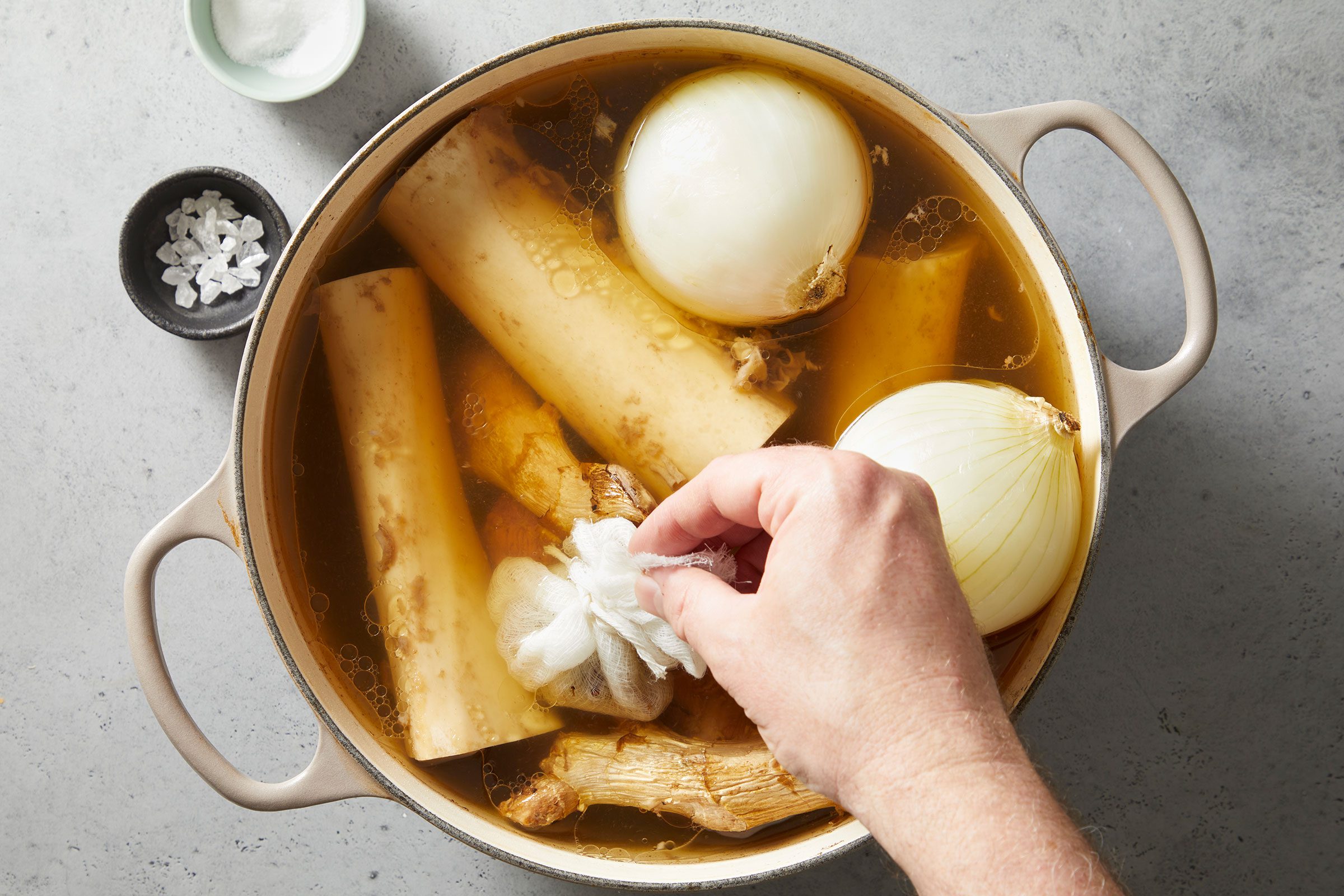 Added roasted onion, ginger and spice bag to the stockpot