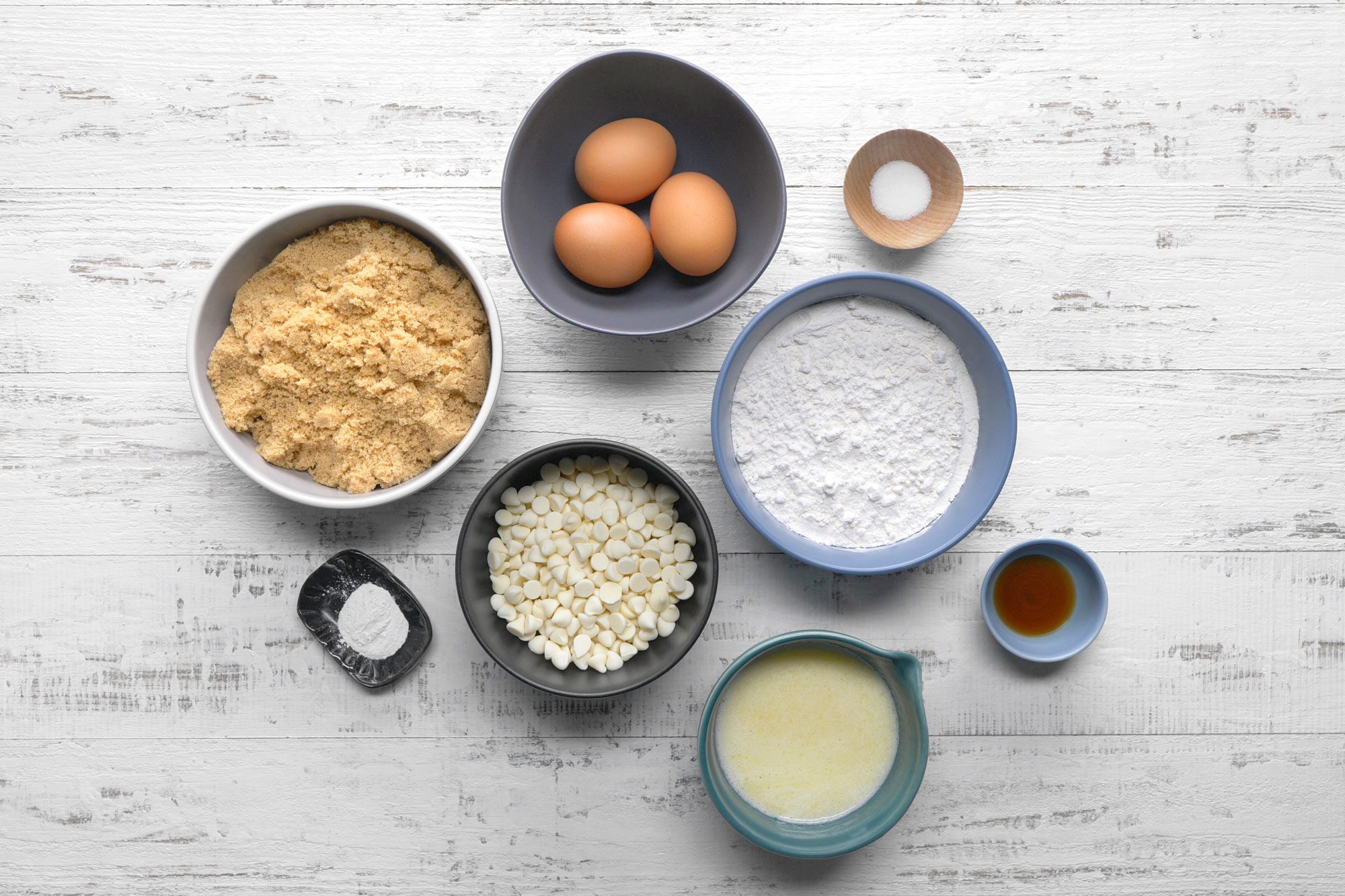overhead shot of blondies ingredients placed over white textured background