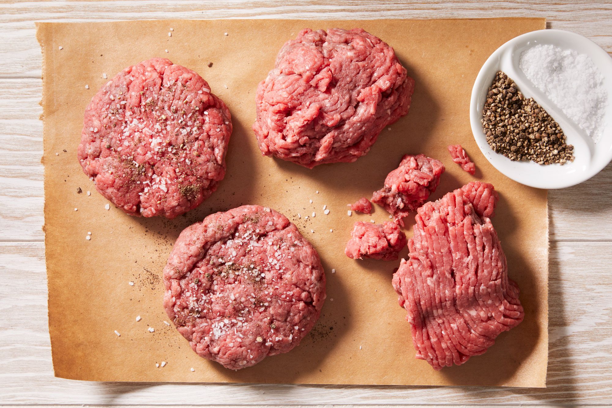 Shape beef into four patties, each 1/2-in. thick. Sprinkle ground patties with salt and pepper.