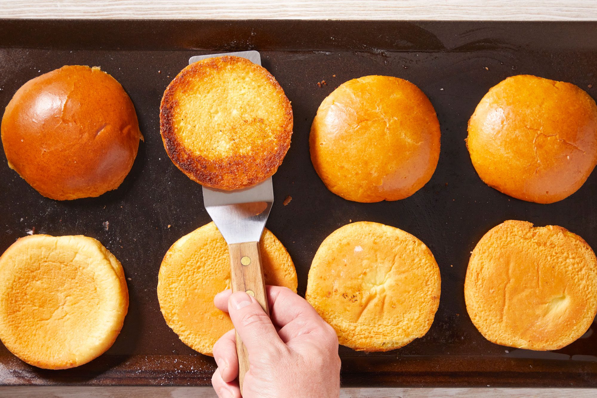 Add remaining 1 tablespoon of butter to the pan; add bun. Toast until golden brown.