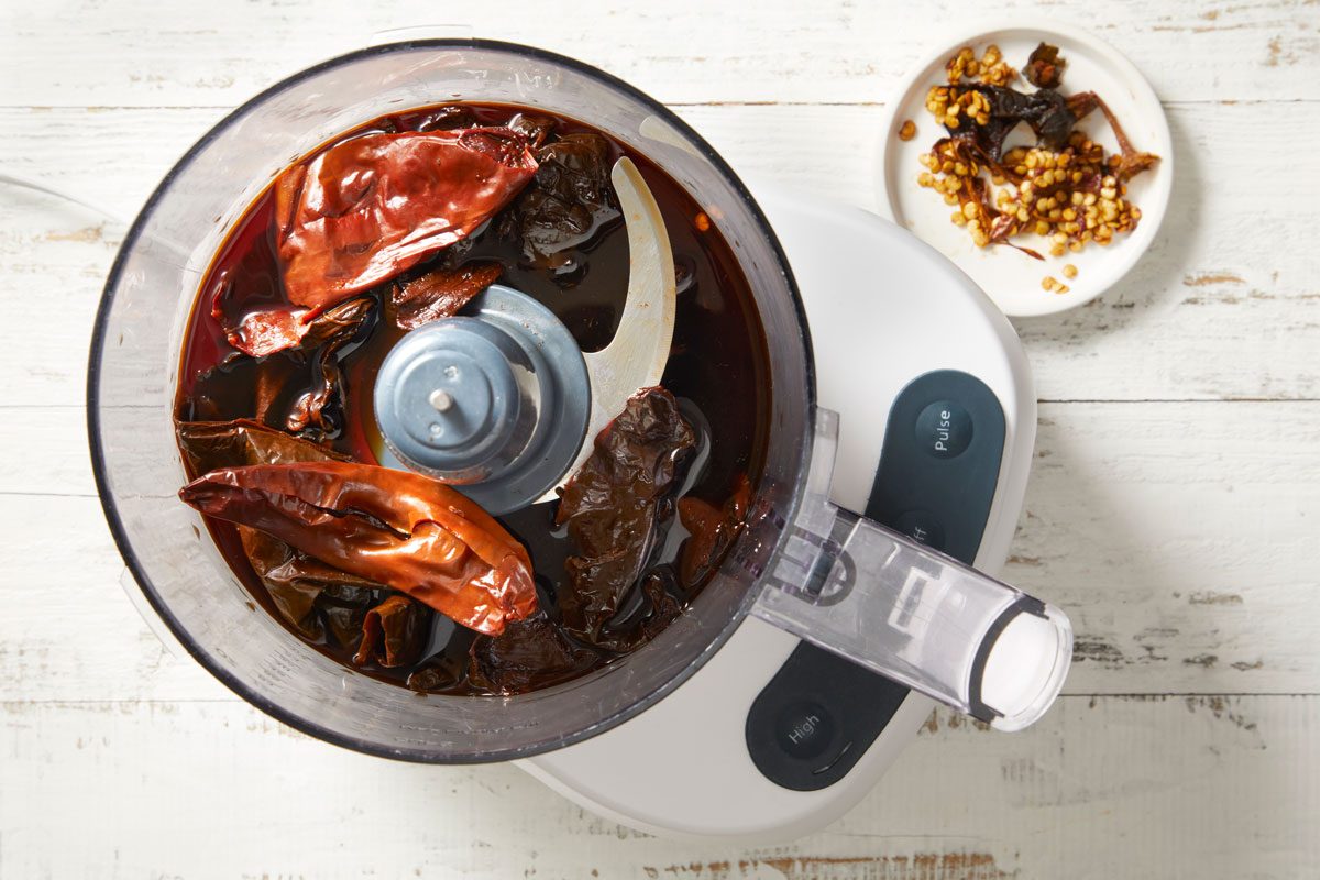 Put chiles and soaking liquid into a food processor