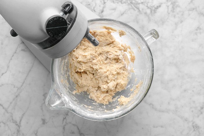 Mixture being mixed to make a dough
