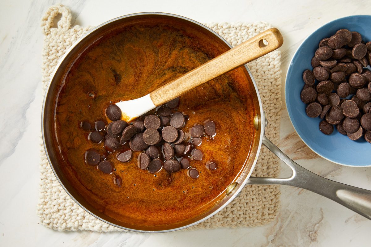 chocolate chips added to date syrup and butter mixture