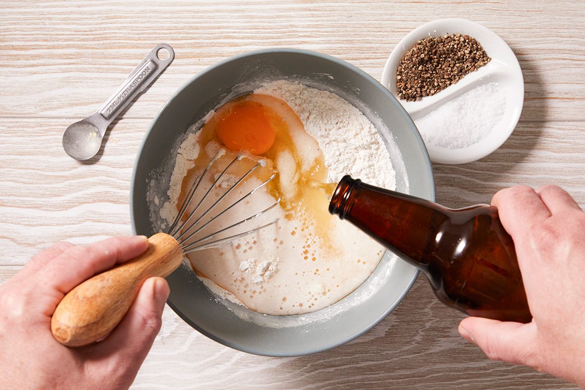 In a shallow bowl, combine flour, baking powder and seasonings. Stir in beer and egg until smooth.