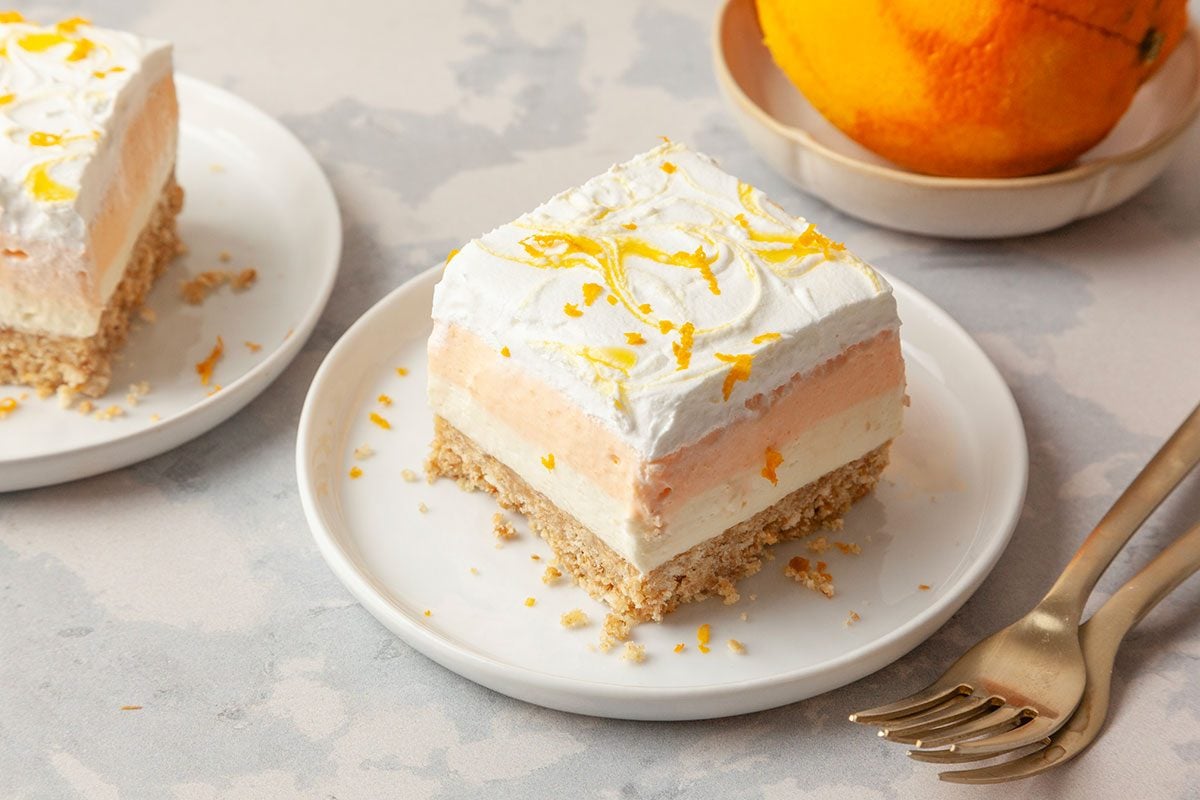 Orange Creamsicle Bars on a plate and ready to eat