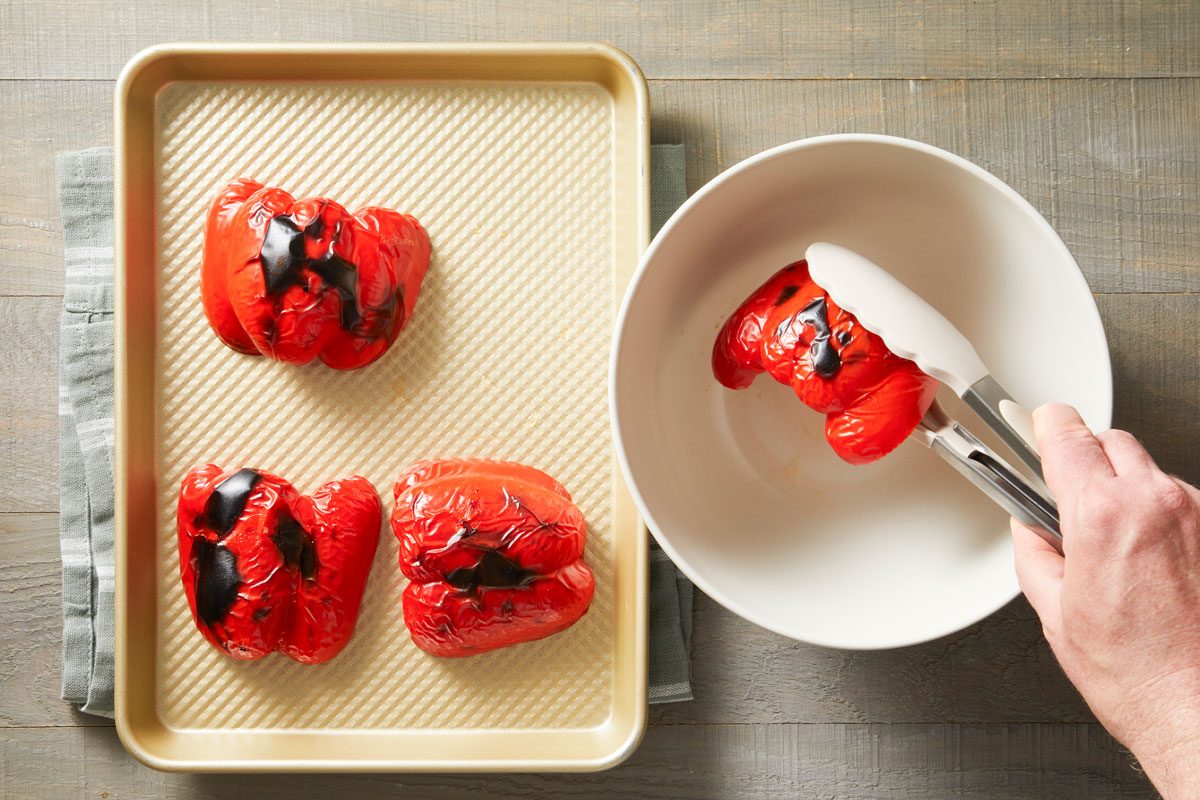 Broil red peppers 4 in. from the heat until skins blister