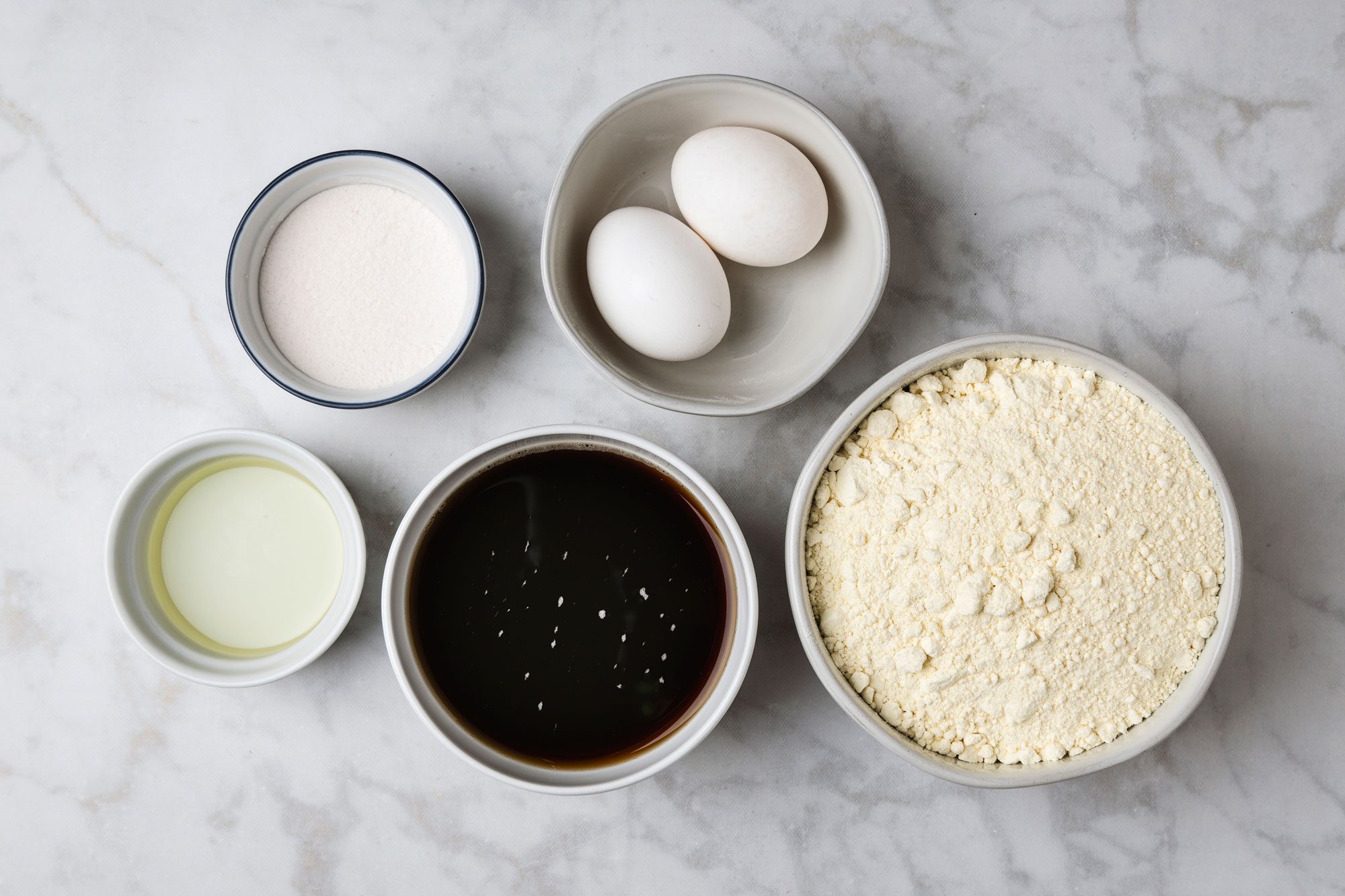 Overhead shot of all ingredients arranged on a marble surface