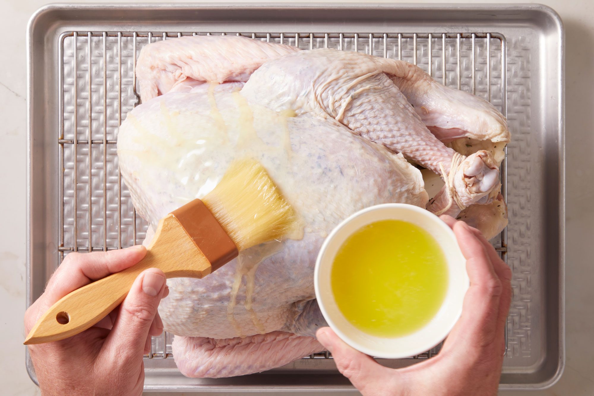 Brush turkey with butter.