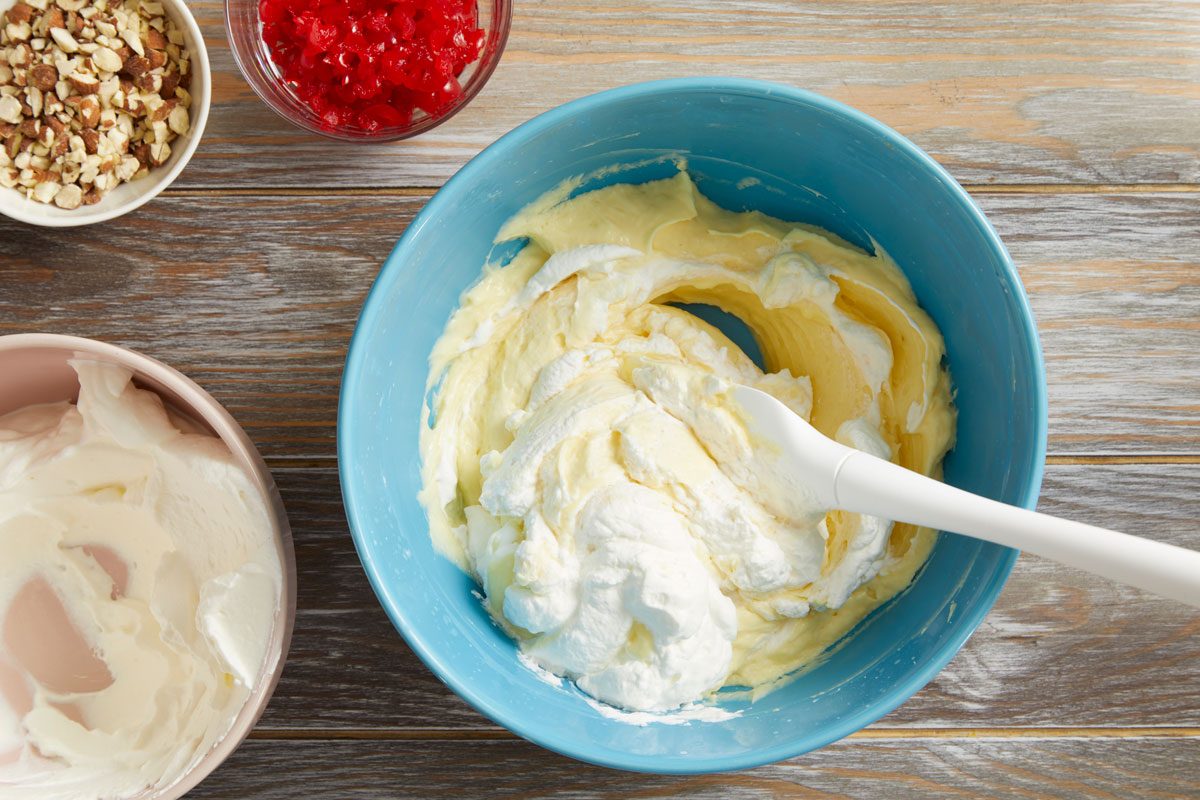 Beat in pudding mix and remaining extract.