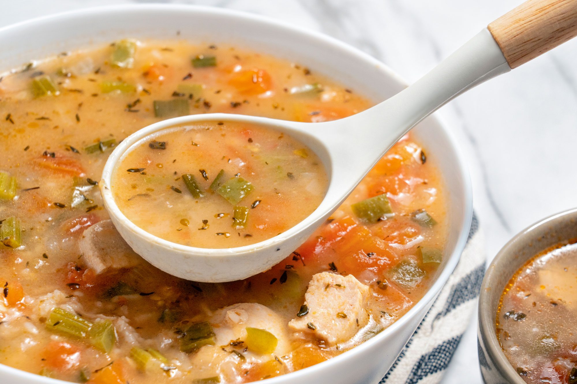 Close up shot of Tomato Chicken Rice Soup