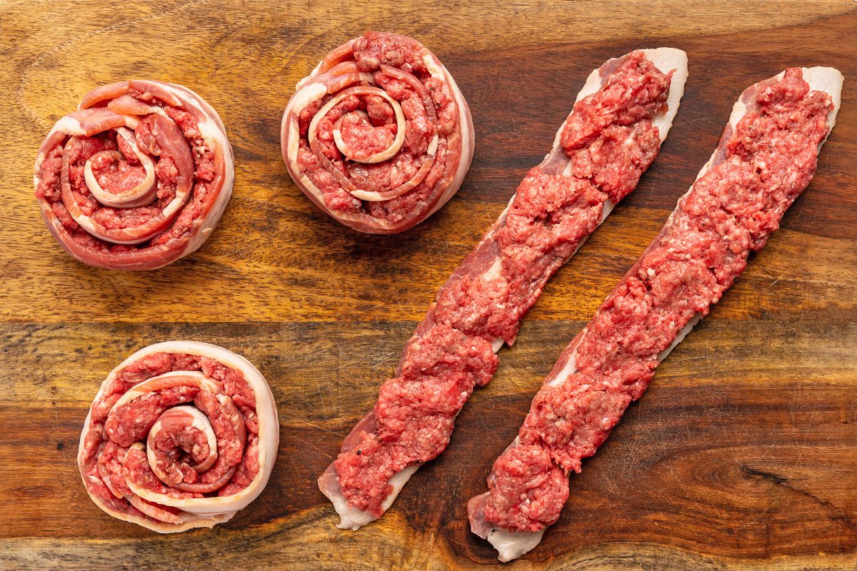 Strips of bacon on a wooden table