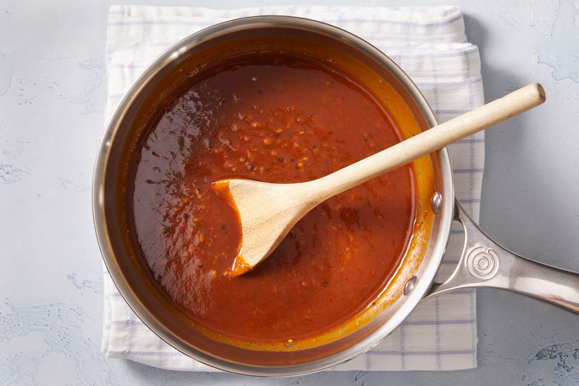 In a small saucepan on the grill, cook reserved marinade over medium heat, stirring until slightly thickened,