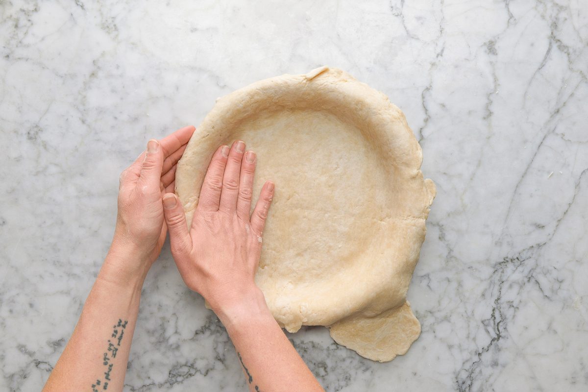 rolled out pastry transferred to plate