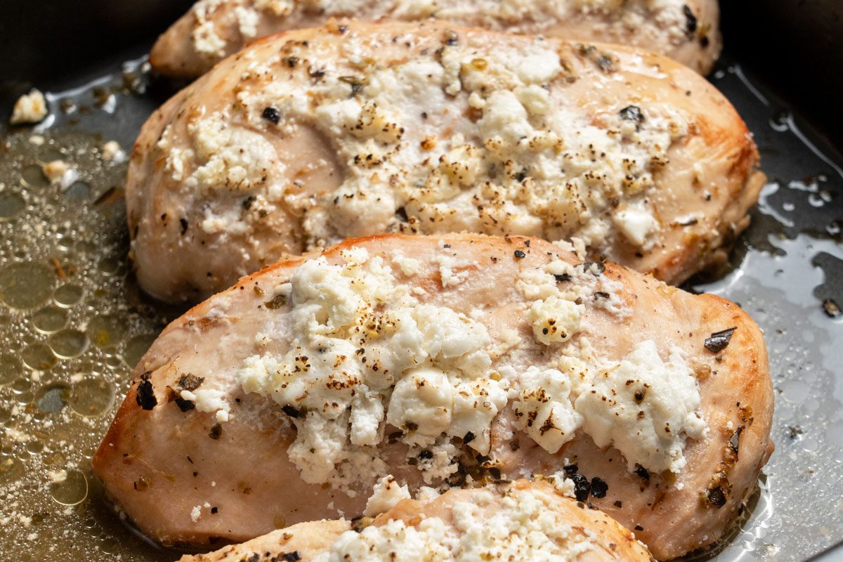 Close up shot of Lemon Feta Chicken in the same baking dish;