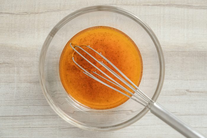 canola oil, sugar, tarragon vinegar, salt, hot pepper sauce and pepper mixed in a bowl