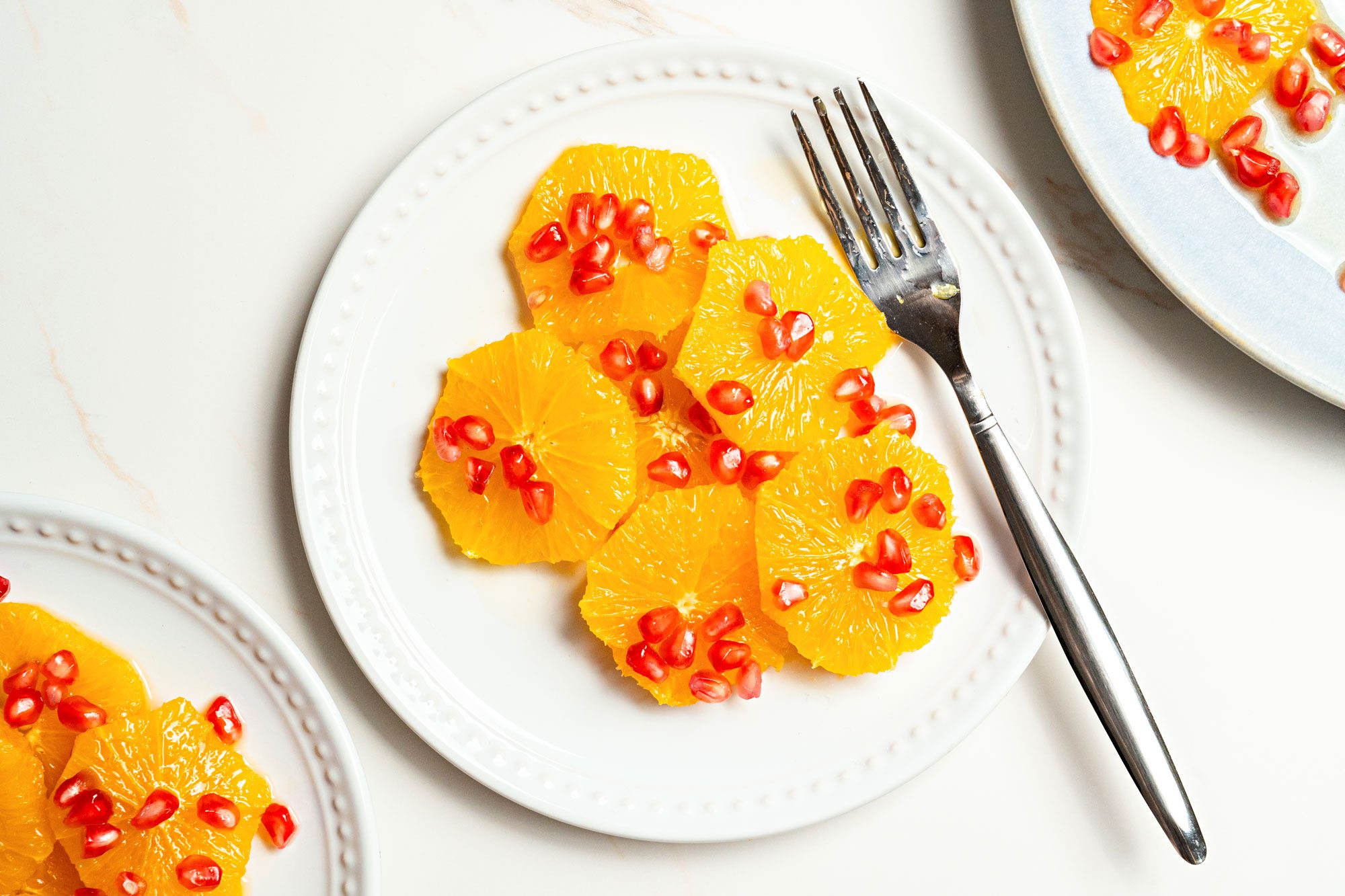 Overhead shot of Orange Pomegranate Salad with Honey