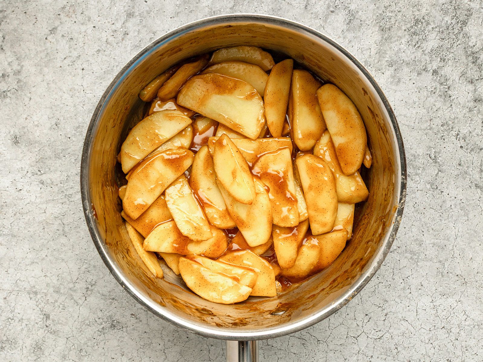 apples with spices in a bowl