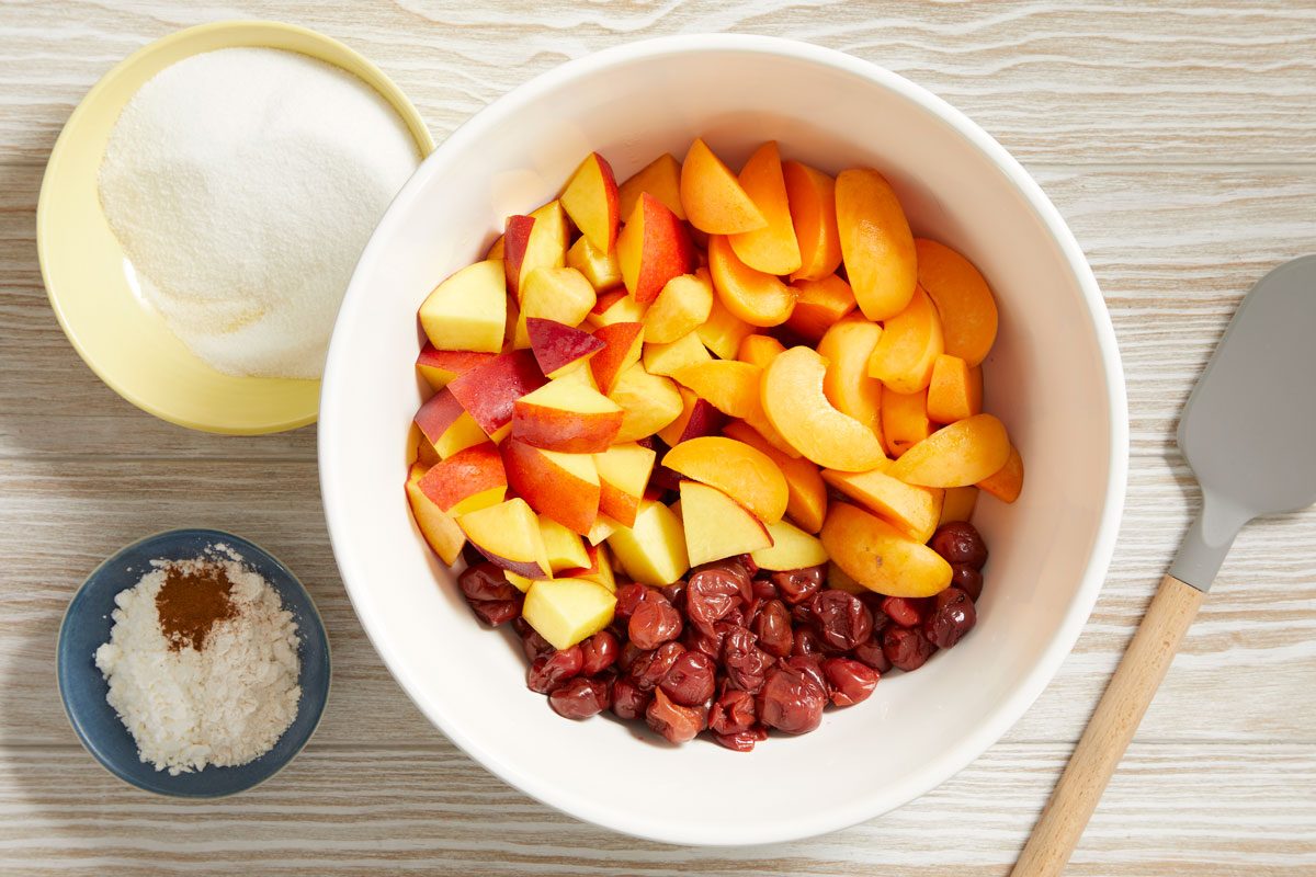 In a small bowl, combine the cherries, nectarines, apricots, sugar, cornstarch, 2 tablespoons flour and cinnamon