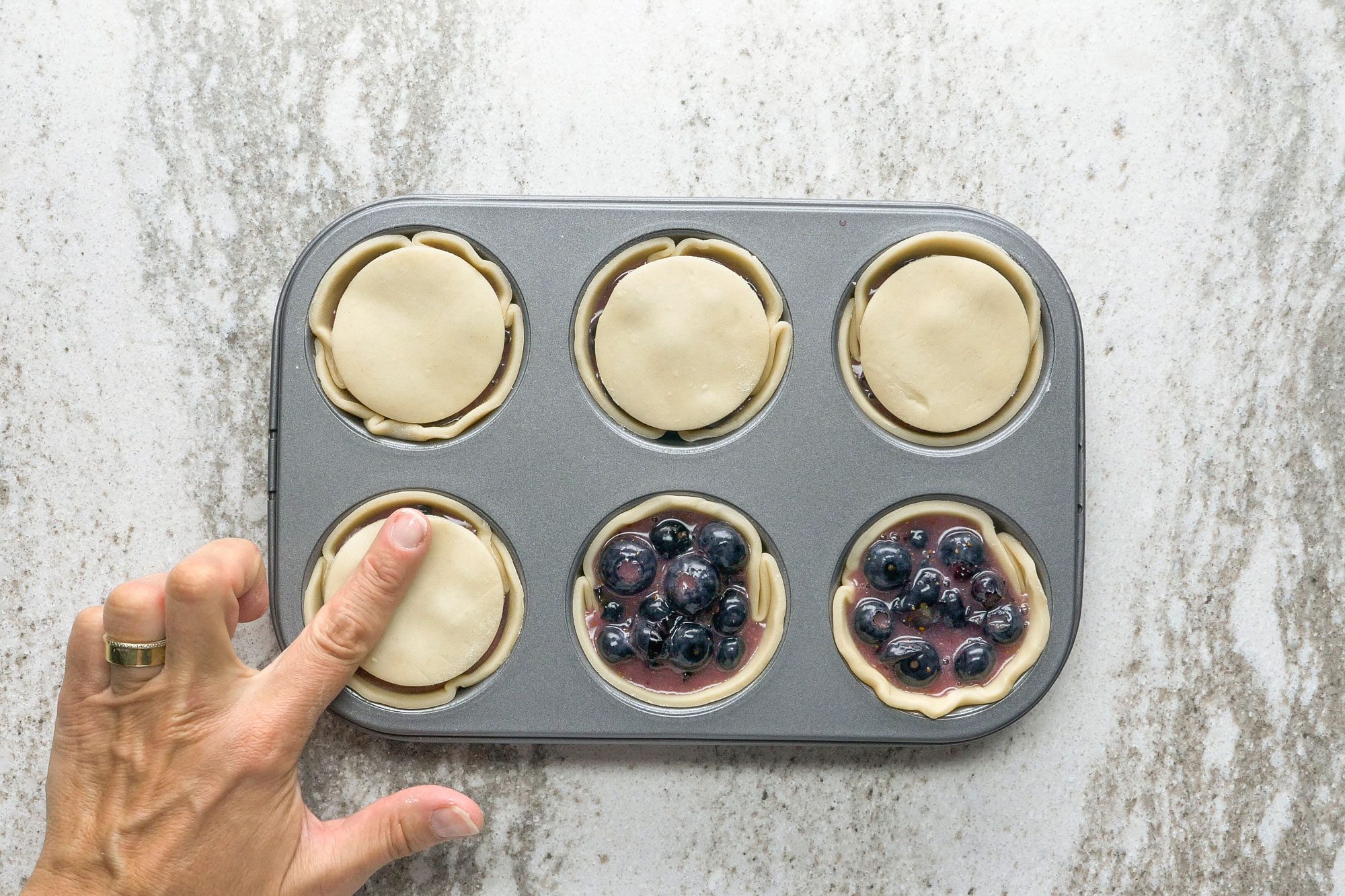 Place 2 inches crust circle over filling; Brush with yolk