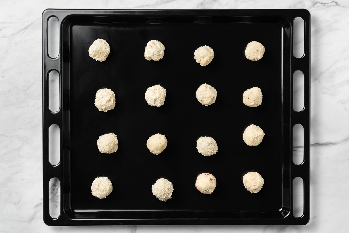 cookie dough balls placed 2 inches apart on ungreased baking sheet