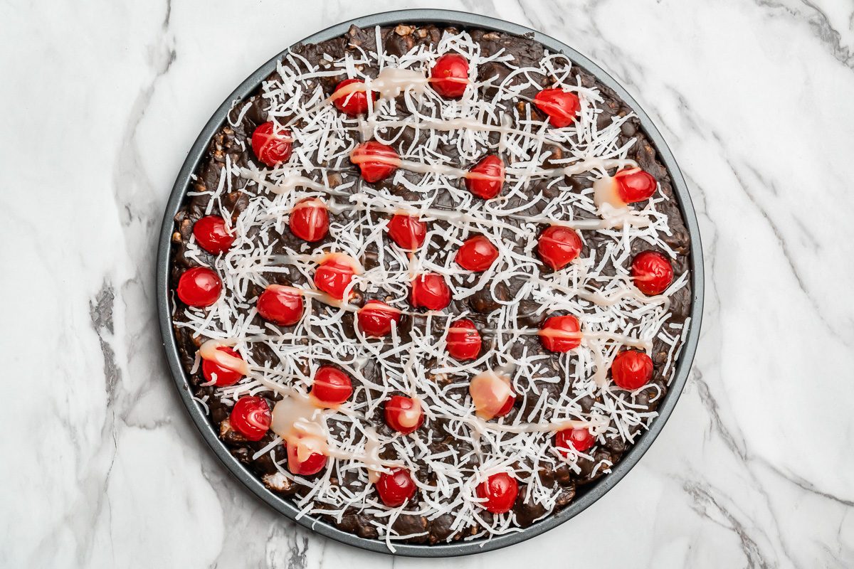 vanilla chips and oil mixture drizzled over pizza