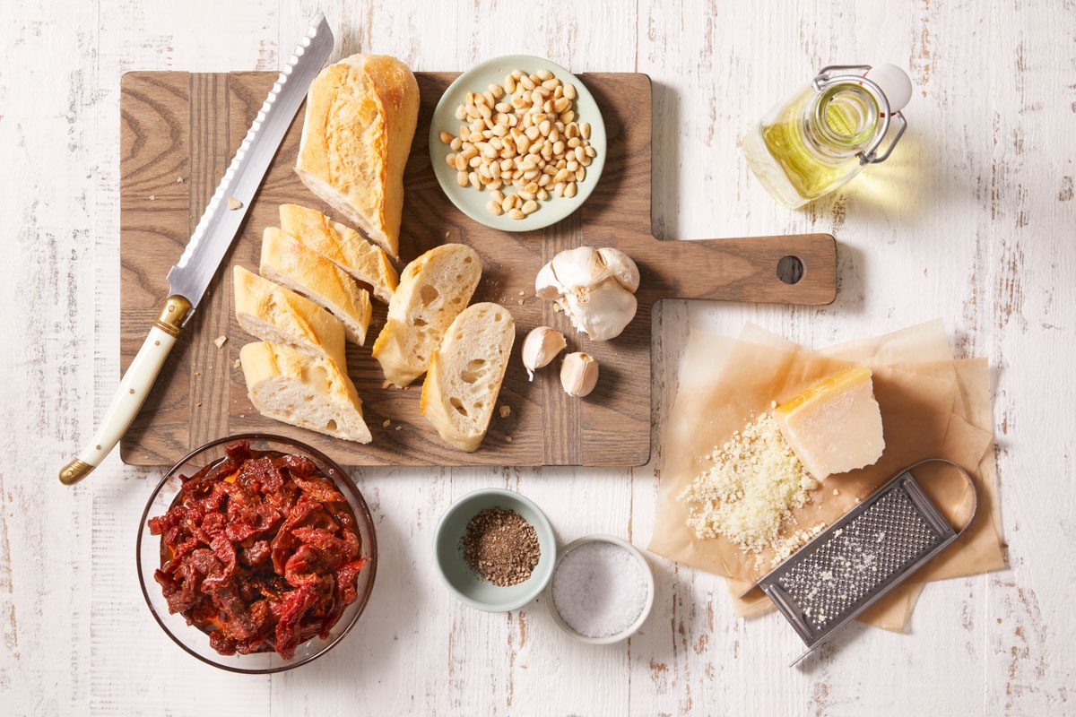 Overhead shot of ingredients for Easy Sun Dried Tomato Pesto