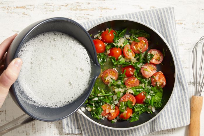 Beat egg whites until foamy; pour into skillet.