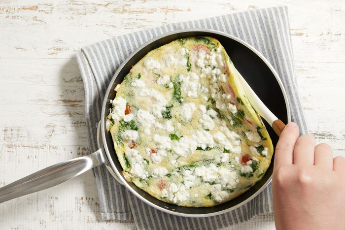 Loosen edges and bottom of frittata with a rubber spatula;