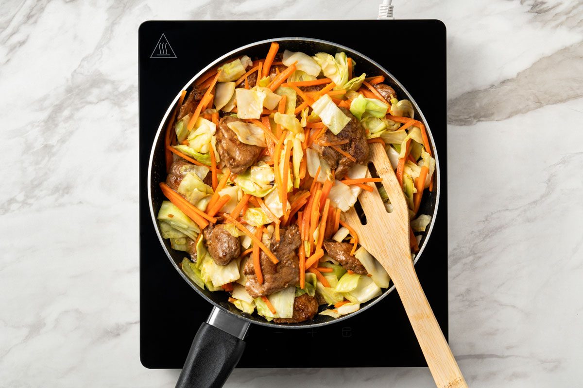 Stir in the cabbage mixture. Bring to a boil;