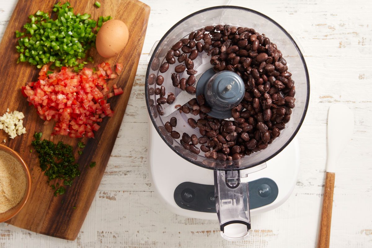 Place beans in a food processor; cover and process until blended.