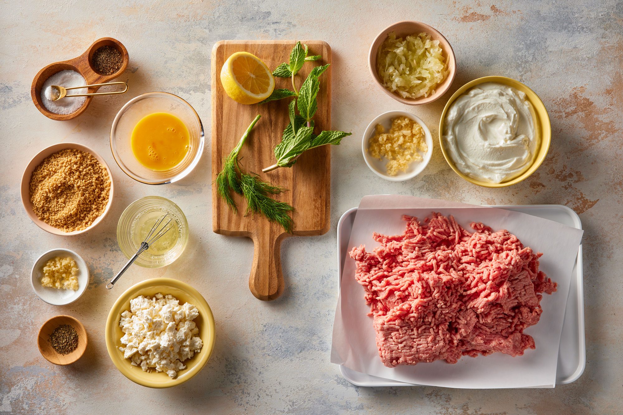 Overhead shot of ingredients for Greek Meatballs on the counter