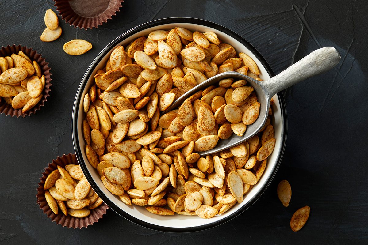 Overhead shot of Spicy Pumpkin Seeds in a large bowl